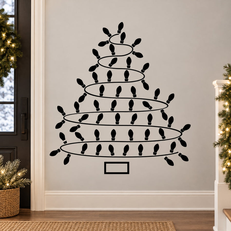 Black Christmas tree wall decal with tiered bulb silhouettes and small base outline