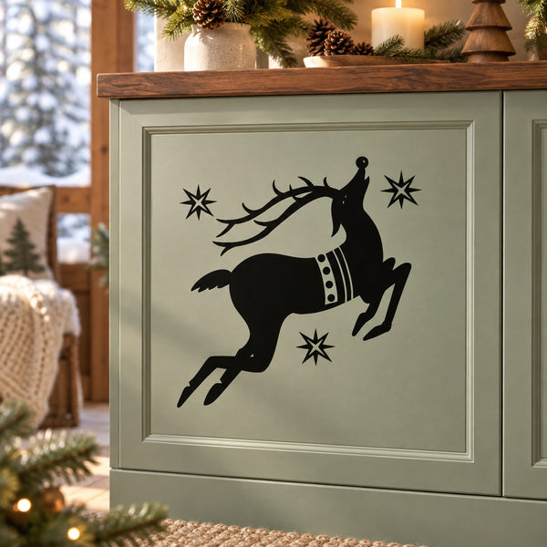 Black reindeer silhouette decal with star accents, holiday wall decor