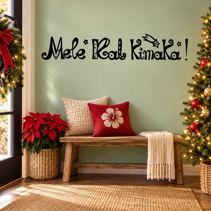 Mele Kalikimaka wall decal in black cursive with star accents and exclamation mark