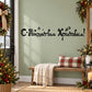Christmas greeting wall decal with dark lettering and small star icons