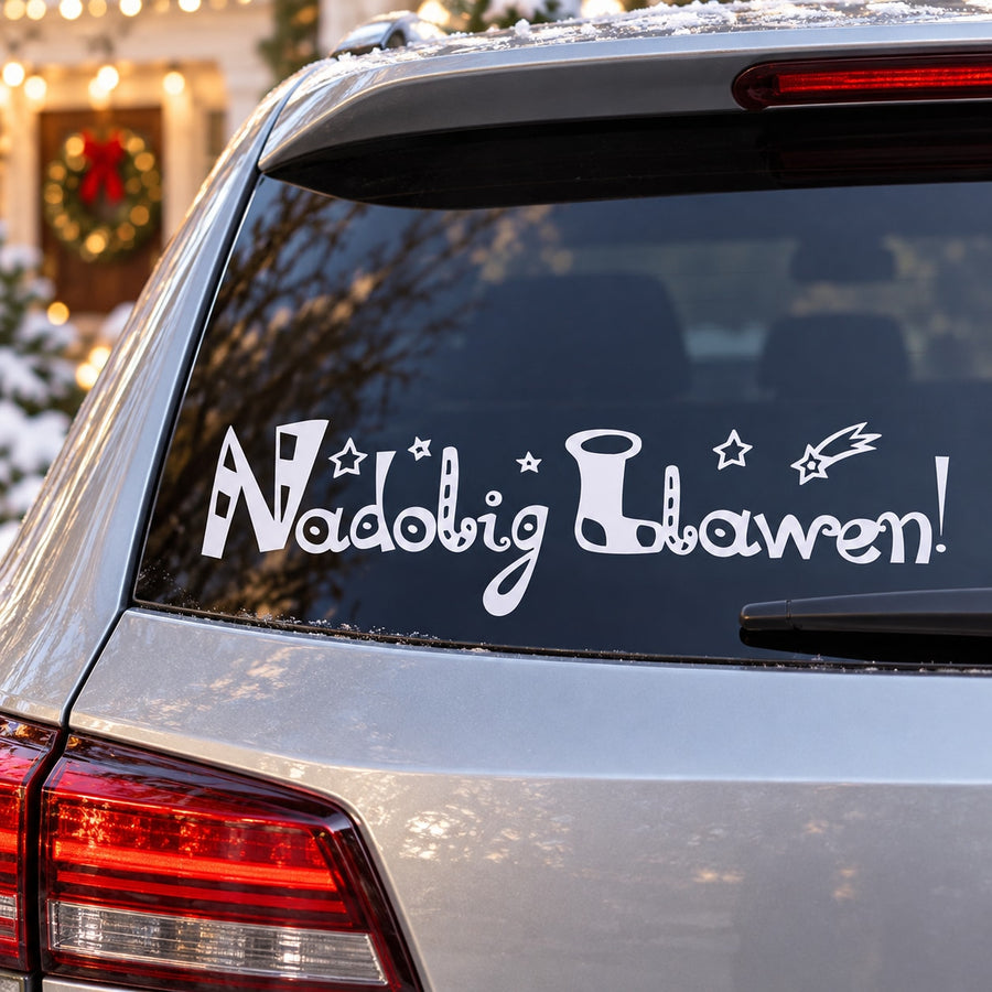 Welsh Christmas car window decal with white "Nadolig Llawen" text and stars