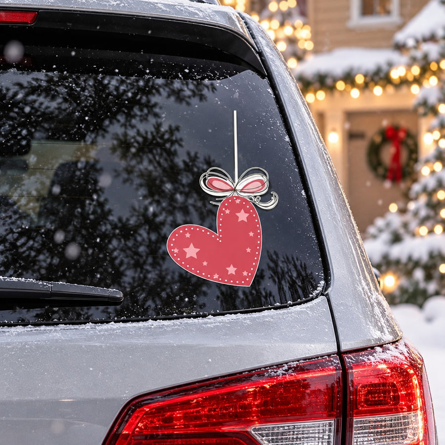 Heart ornament car sticker: red hanging heart with bow and white star accents