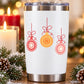 Christmas ornament decal with three abstract circular designs on a white tumbler