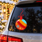 Striped and dot Christmas ornament decal with red bow on car window