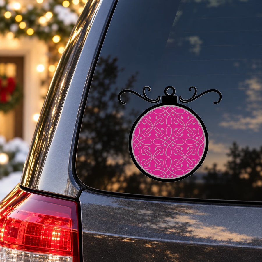 Pink ornament die-cut decal with floral swirl pattern, black decorative outline