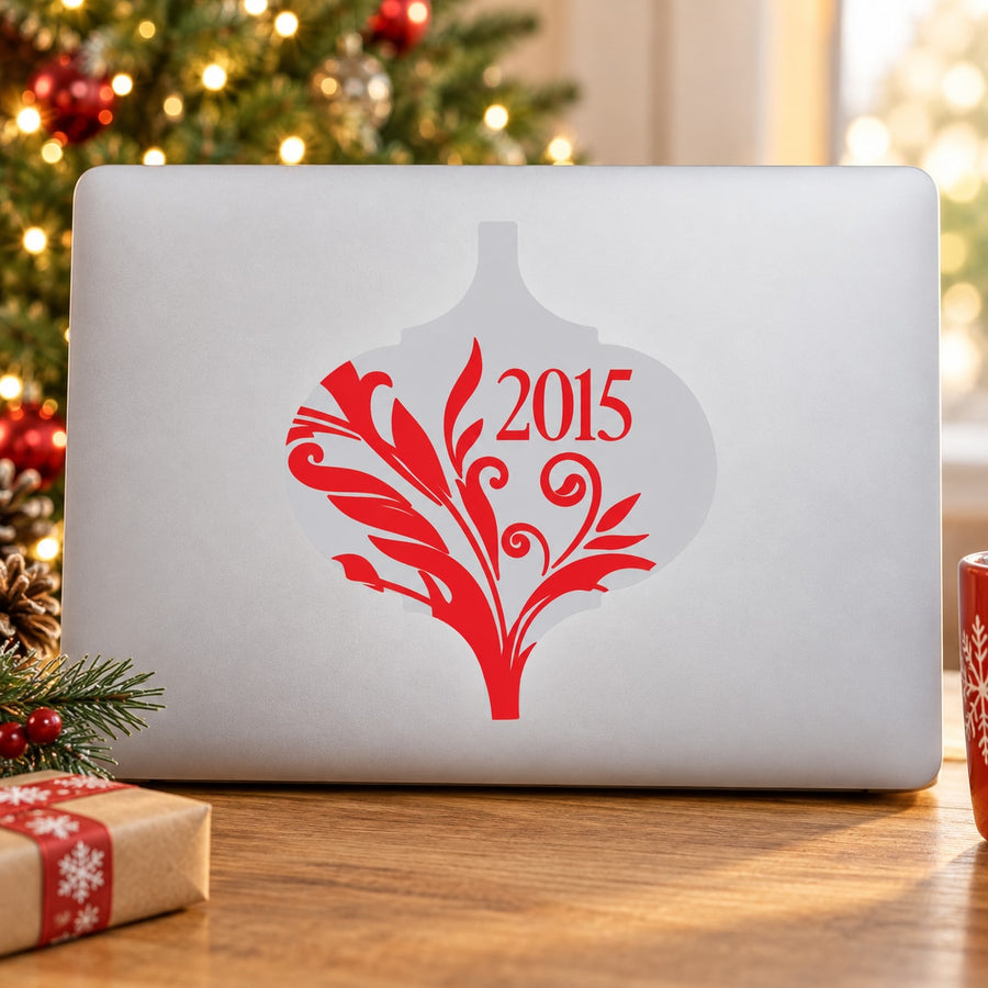 Holiday year ornament sticker with red 2015 tree design
