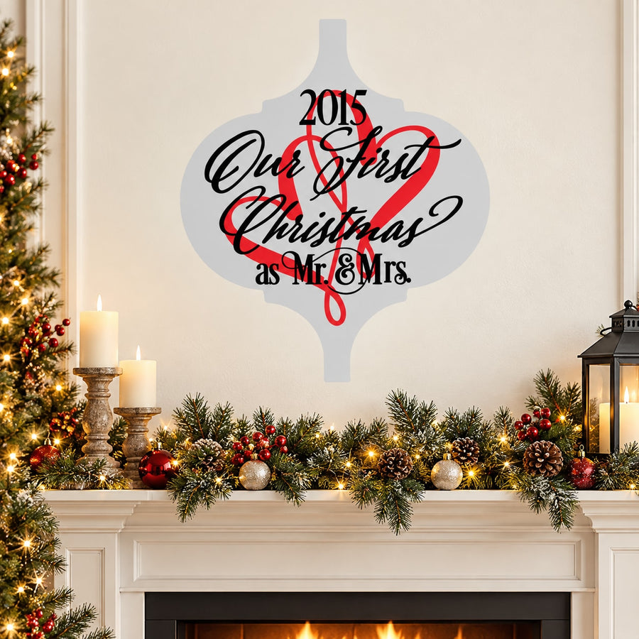 Christmas ornament sticker with 2015 and red/black script text, shaped like a hanging ornament
