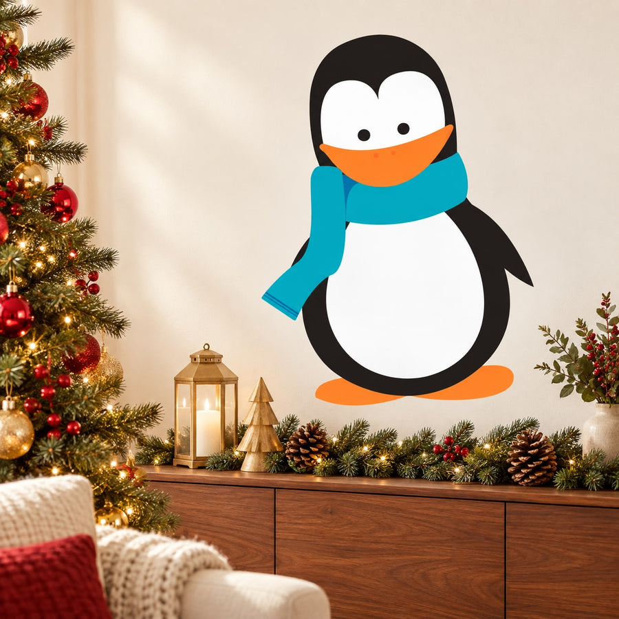 Cartoon penguin sticker with blue scarf and orange beak, black and white body