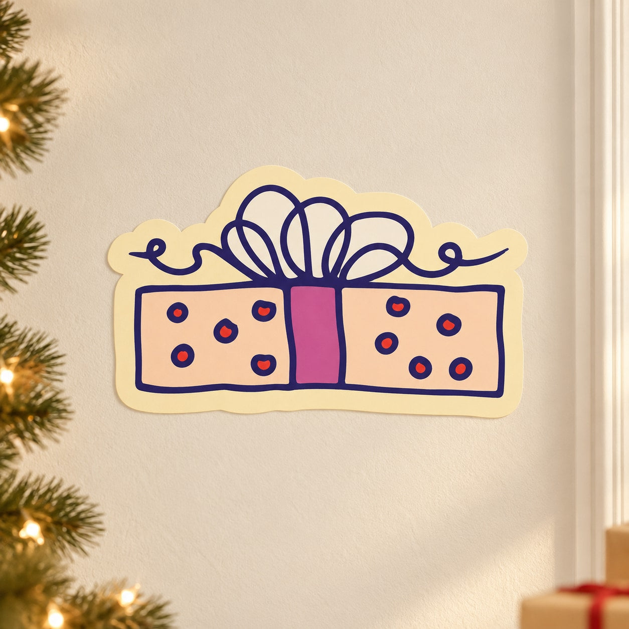 Pink and navy gift present sticker with bow and polka-dot box panels