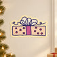 Pink and navy gift present sticker with bow and polka-dot box panels