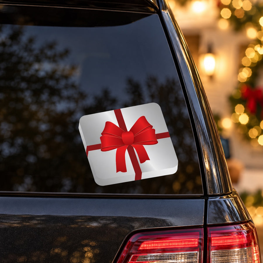 Rectangular gift sticker with white background and large red bow