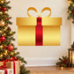 Golden Christmas present sticker with large bow and red ribbon