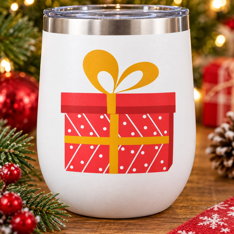 Christmas present sticker on white tumbler: red dotted gift box with yellow bow