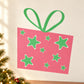 Pink rectangular gift with green ribbon and small star stickers