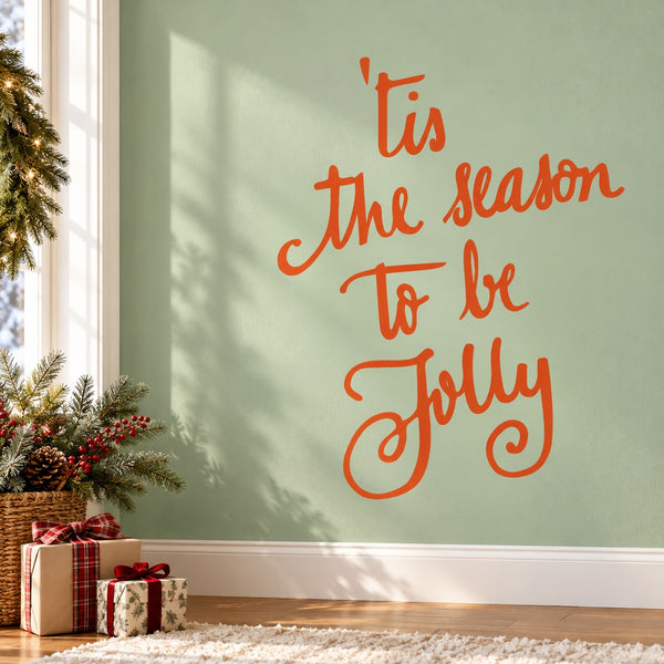 Orange cursive holiday quote wall decal: 'Tis the season to be jolly'