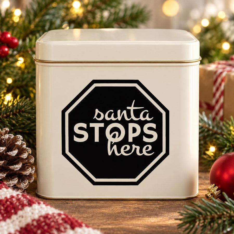 Santa Stops Here sign decal with black octagon and white holiday lettering