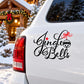 Jingle Bells script decal with red bow and bell on white car panel