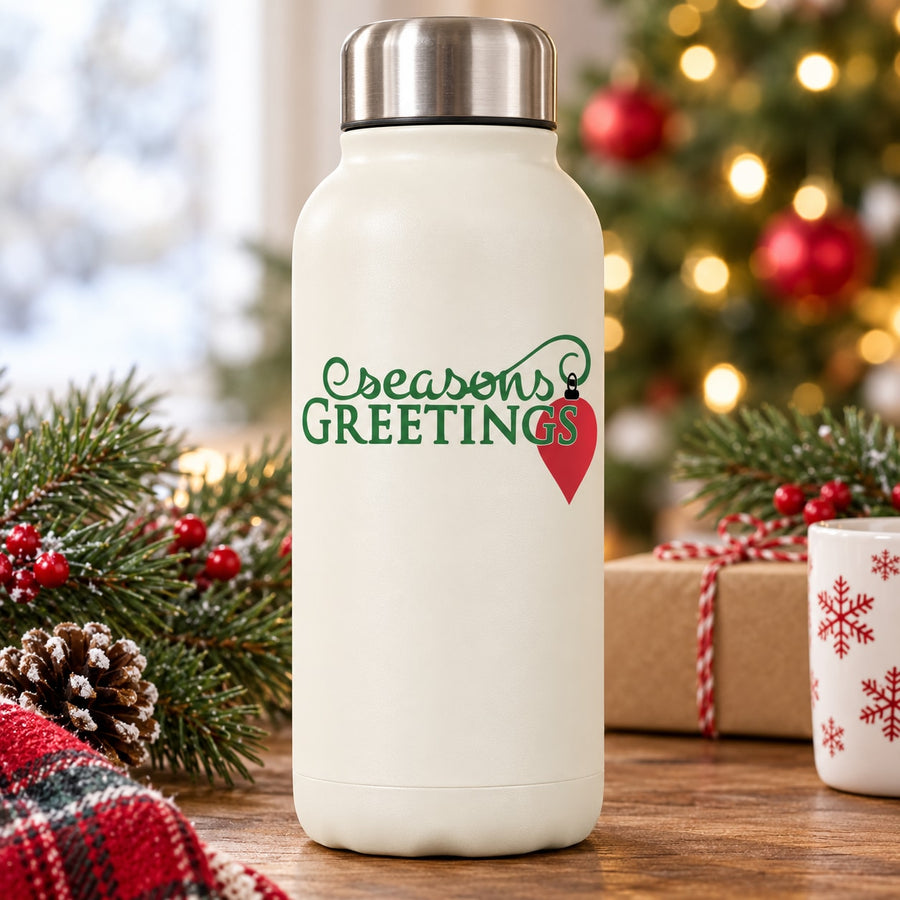 White bottle with green Seasons Greetings text and red heart ornament decal