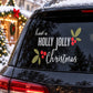 Christmas car window sticker reading “Have a HOLLY JOLLY Christmas” with holly icons