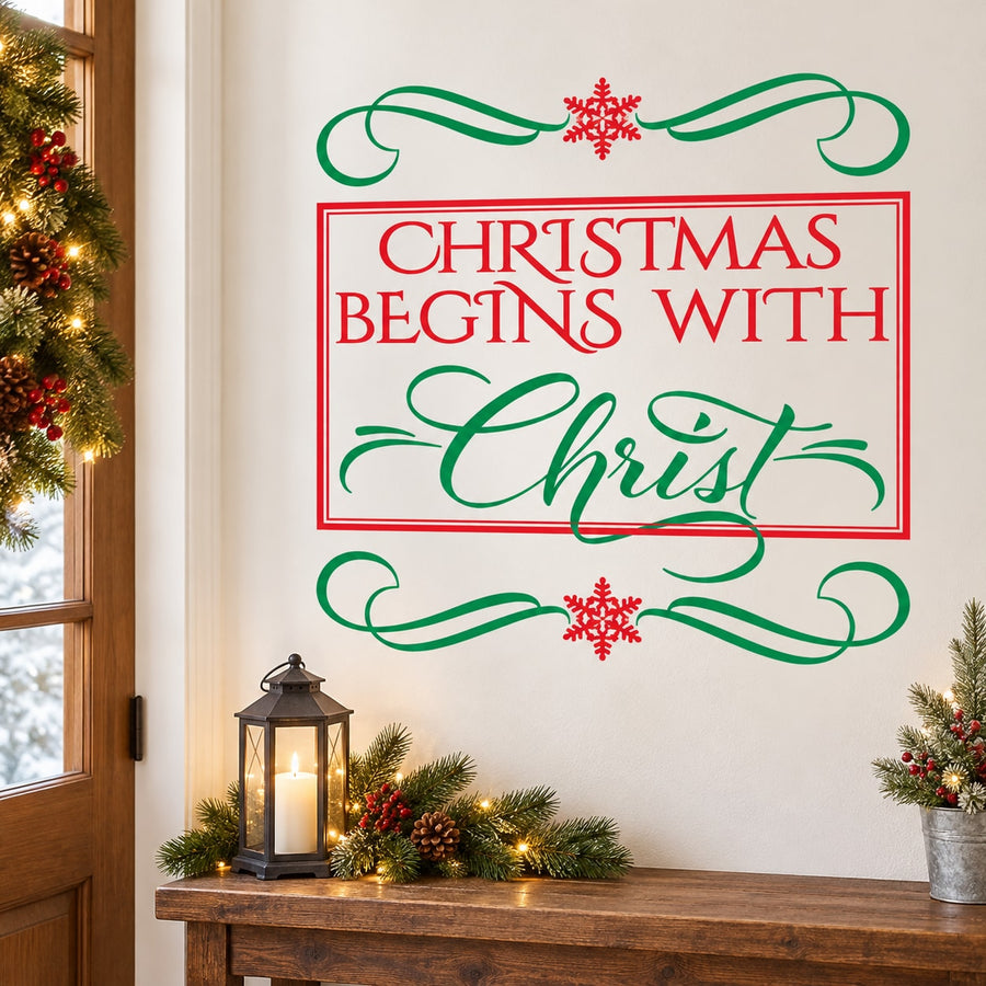 Christmas Begins with Christ wall decal with red frame, green scrolls, and snowflakes