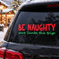 Be Naughty wall decal: red “BE NAUGHTY” with teal “Save Santa the trip”