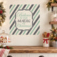 Christmas wall decal with striped border and "Believe in the Magic of Christmas" text