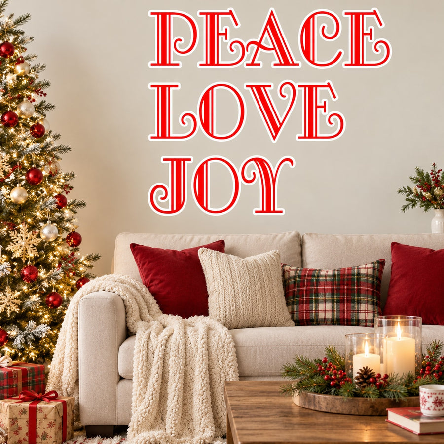 Holiday quote wall decal with red and white “PEACE LOVE JOY” lettering