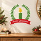 Christmas wreath wall decal with green laurel, yellow candle, and red "Merry Christmas" ribbon