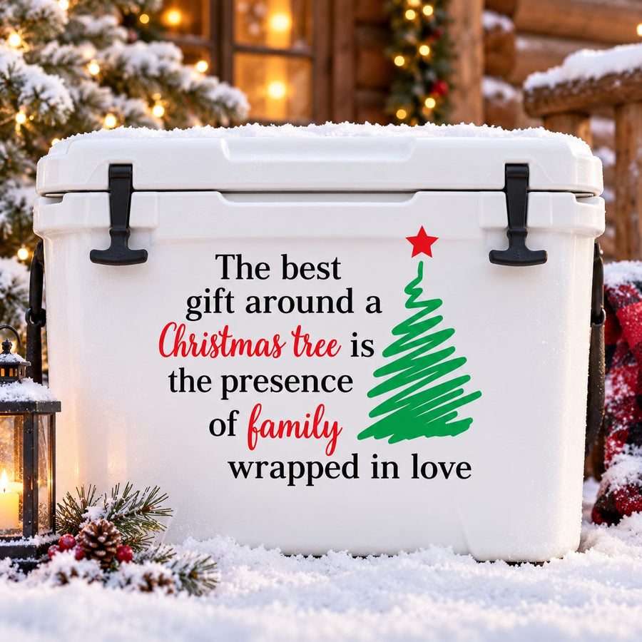 Christmas tree quote decal on white panel, green tree with red star and black lettering