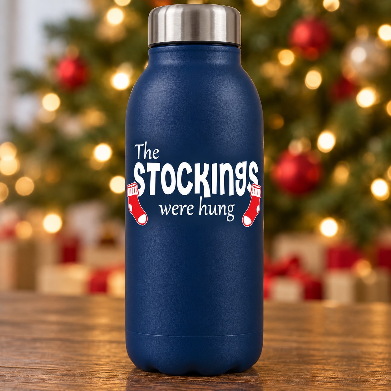 Blue water bottle with "The Stockings Were Hung" quote decal