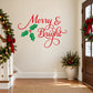 Holiday wall decal with “Merry & Bright” script and green holly leaves with red berries