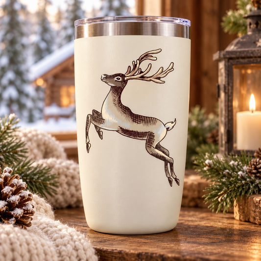 White tumbler with silver lid, featuring a jumping reindeer decal