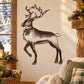 Christmas reindeer buck sticker, black outline with red-and-green wreath collar