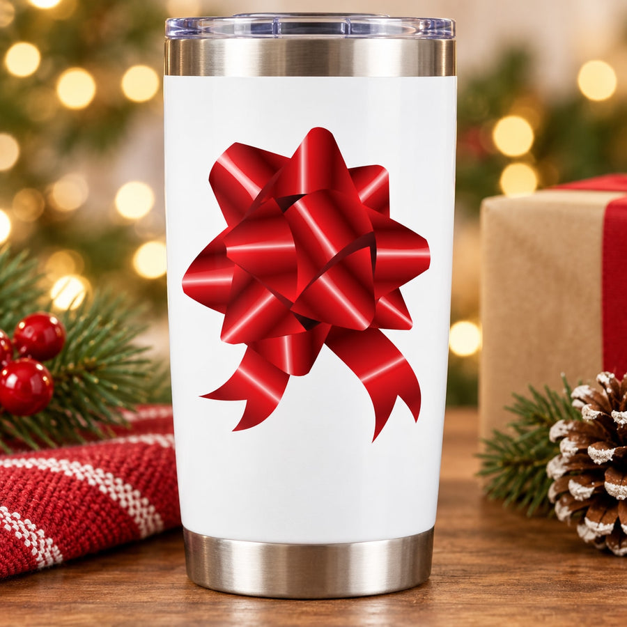 Red glossy ribbon bow decal on white insulated tumbler with silver lid