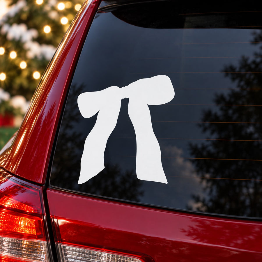 White wavy ribbon bow silhouette decal on car rear window