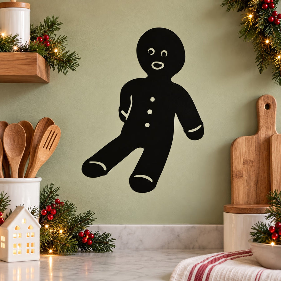 Black sitting gingerbread man wall decal with white buttons and smile accents