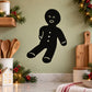 Black sitting gingerbread man wall decal with white buttons and smile accents