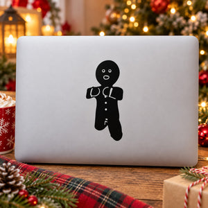 Black gingerbread man silhouette decal with face, buttons, and icing details