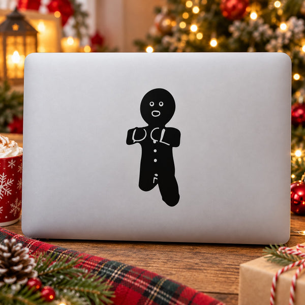 Black gingerbread man silhouette decal with face, buttons, and icing details