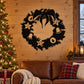 Black decorated wreath decal with star and bell silhouettes