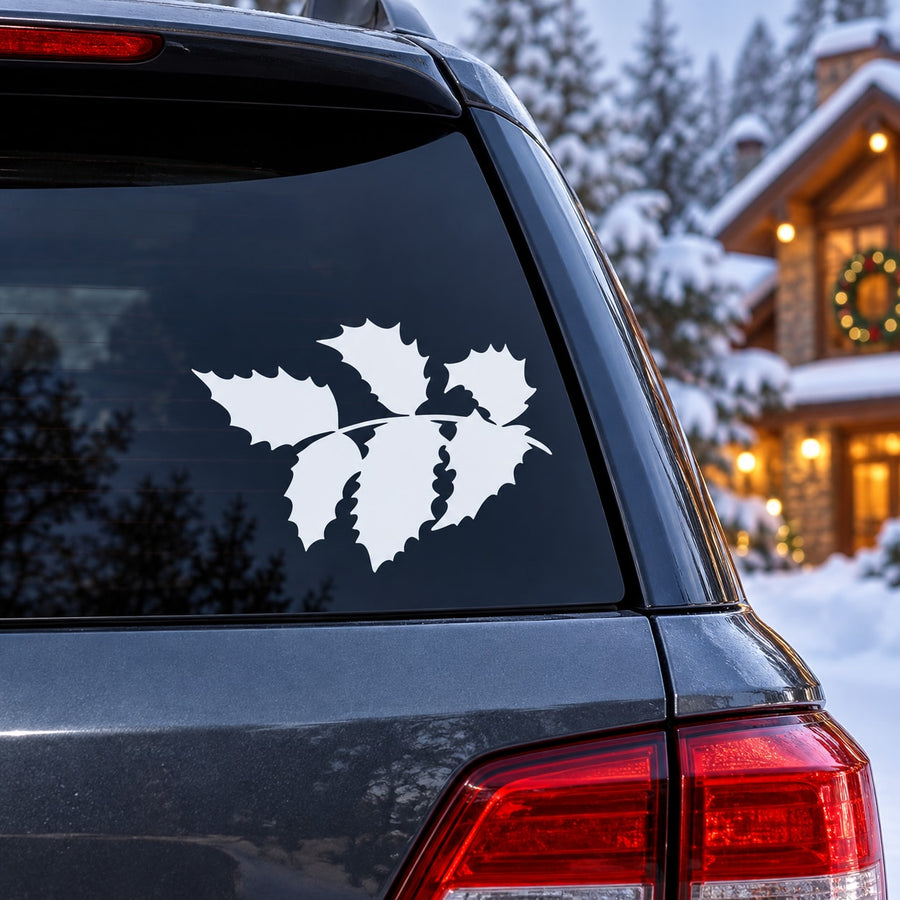 White holly leaves silhouette decal on a car window, leaf-shaped design