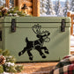 Prancing reindeer decal, black silhouette on light green surface