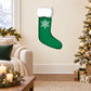 Green Christmas stocking sticker with white snowflake design