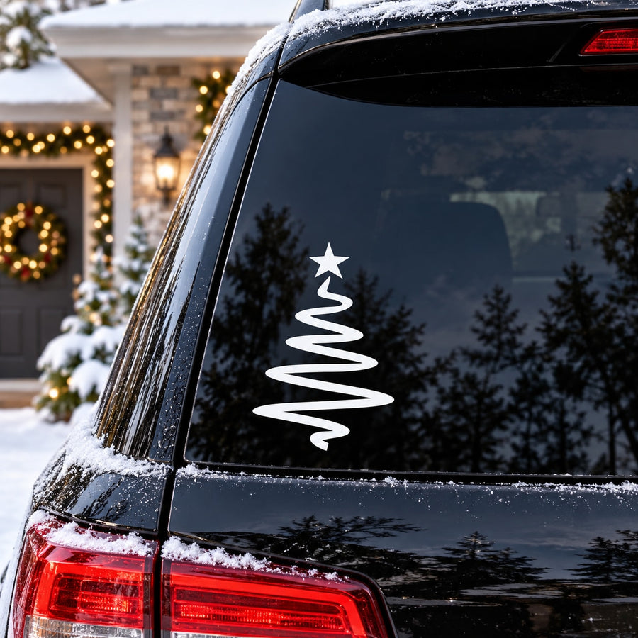 Coiled Christmas tree decal on black car rear window, white swirl tree with star top
