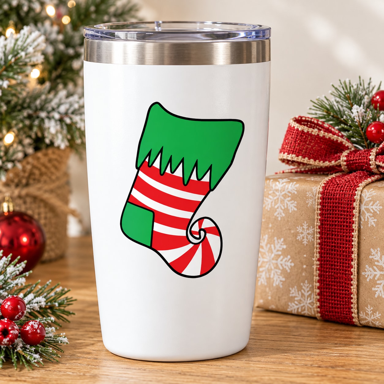Elf stocking vinyl decal on white tumbler cup, green top and red striped pattern