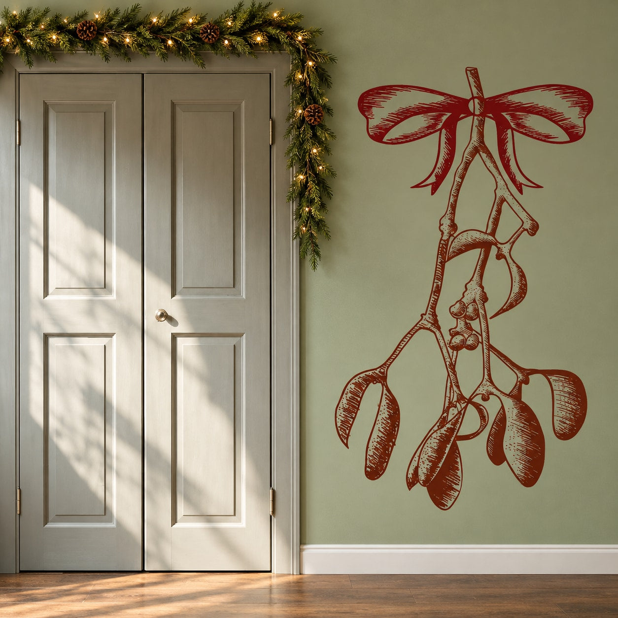 Red mistletoe decal with ribbon bow and hanging bells on wall