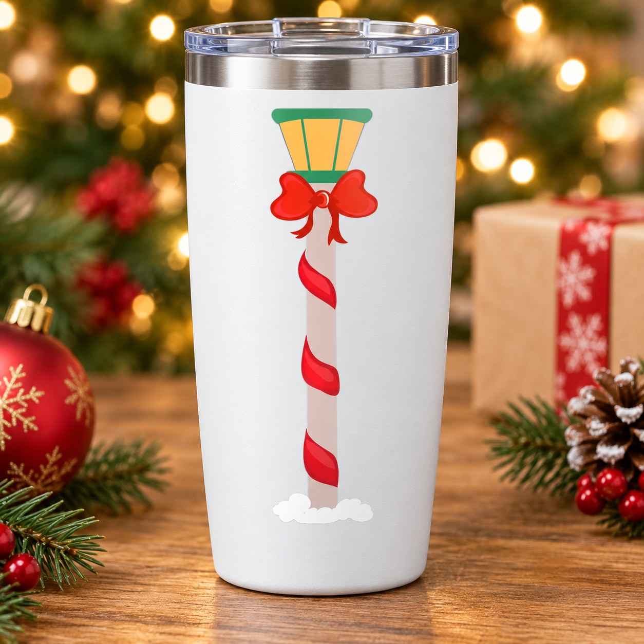 Christmas candy cane decoration sticker with red bow on white surface