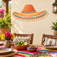 Orange sombrero wall decal with green trim and orange pom-pom fringe, vinyl
