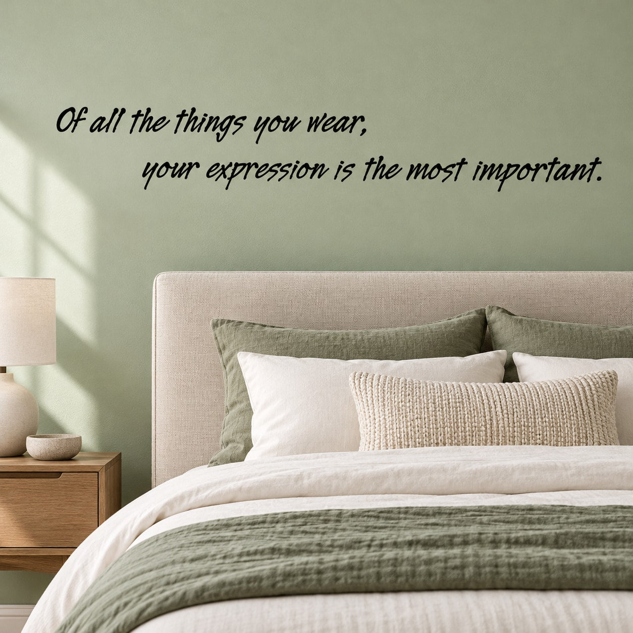 Wall decal quote: "Of all the things you wear, your expression is the most important".