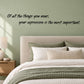 Wall decal quote: "Of all the things you wear, your expression is the most important".